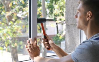 Window installer replacing window (You’re Replacing Your Windows & Doors – Now What)