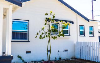 House with new replacement windows (10 Reasons Why You Should Replace Your Windows)