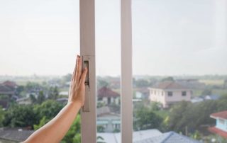 Woman's,Hand,Opens,The,Old,Sliding,Glass,Window.,Selective,Focus.