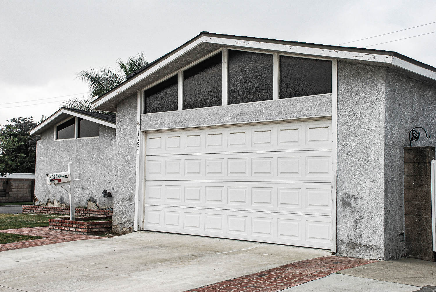 Before picture -Window Replacement & Tex-Cote Paint Job in Montebello, CA