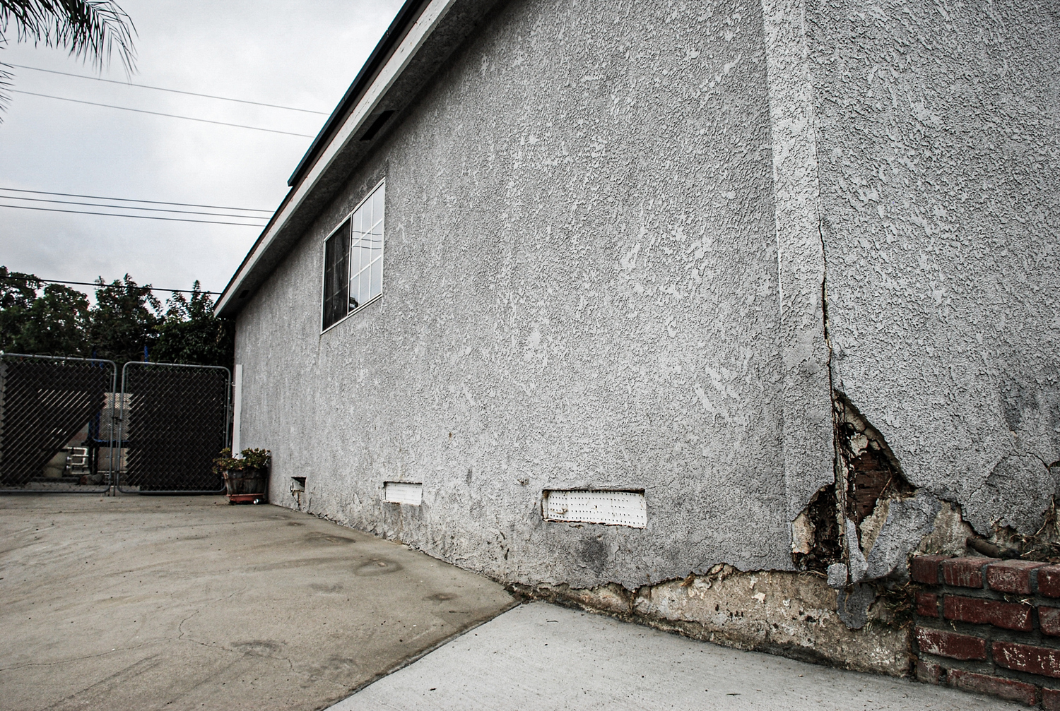 Before pic - Window Replacement & Tex-Cote Paint Job in Montebello, CA